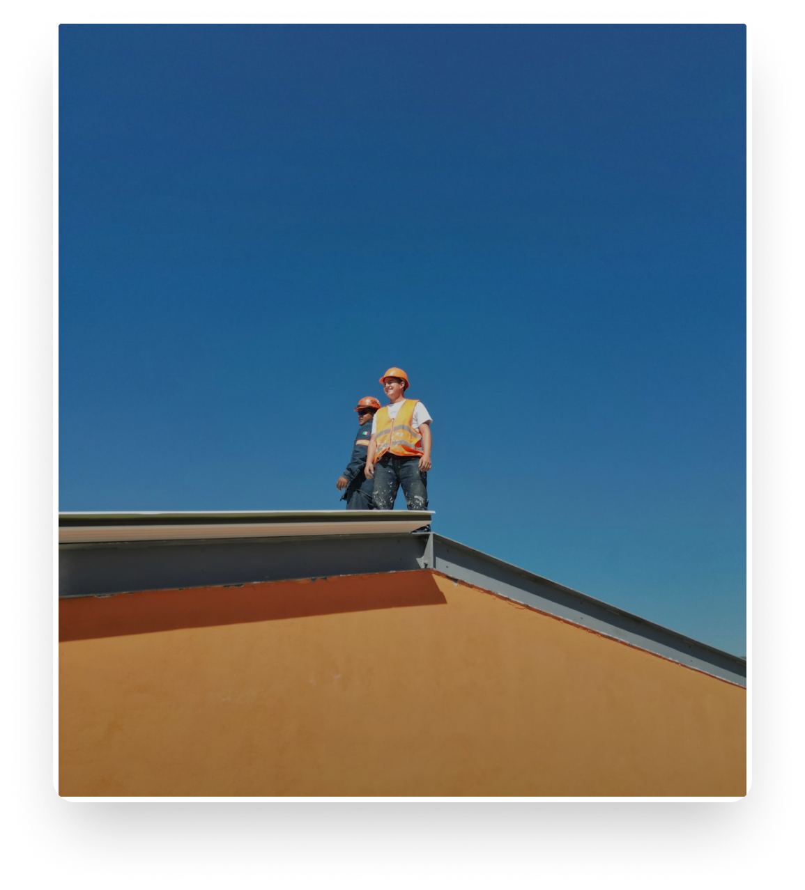 Construction workers on roof